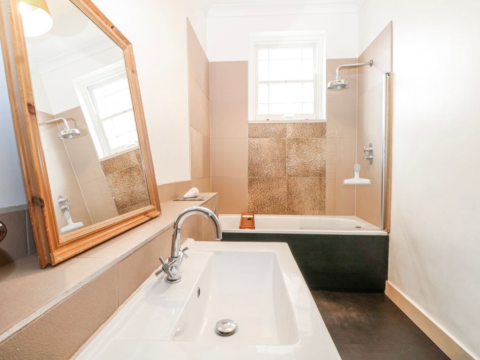 A bathroom with a bath tub and shower at Broadstairs Beach in Broadstairs