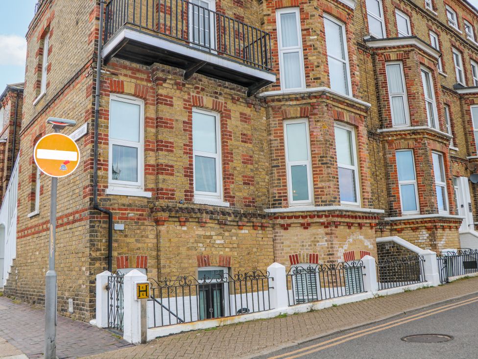 A building exterior with multiple windows and a balcony at Broadstairs Beach in Broadstairs