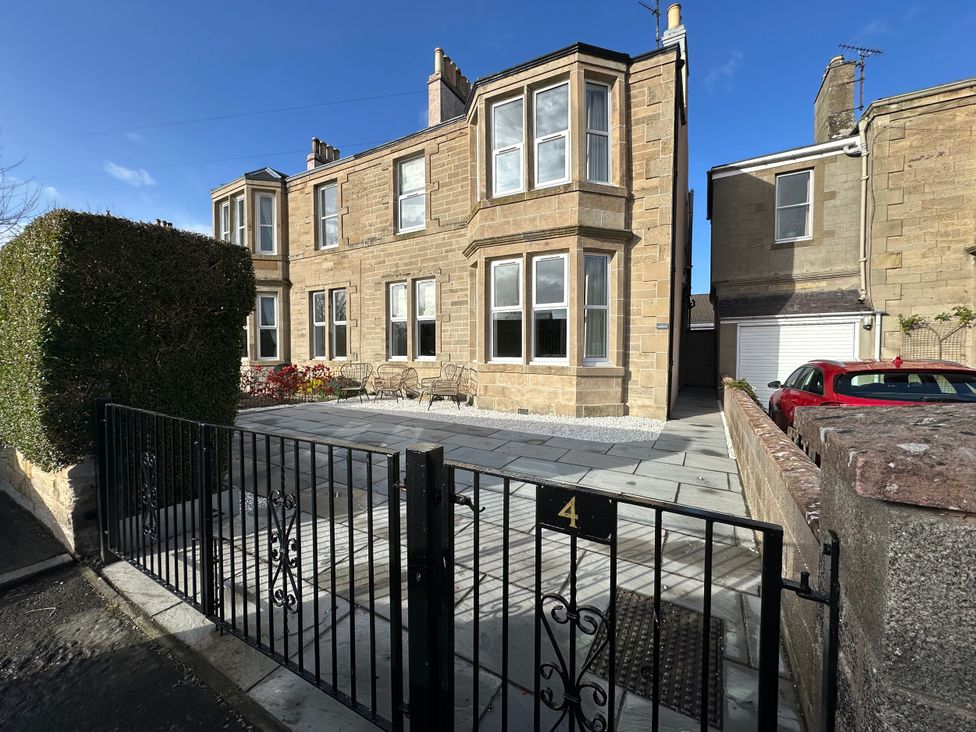 A house with windows and a gate at Abbotsford in Kelso