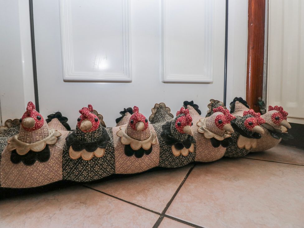 A decorative mat with chicken designs at Linden Lea in Field Broughton near Cartmel
