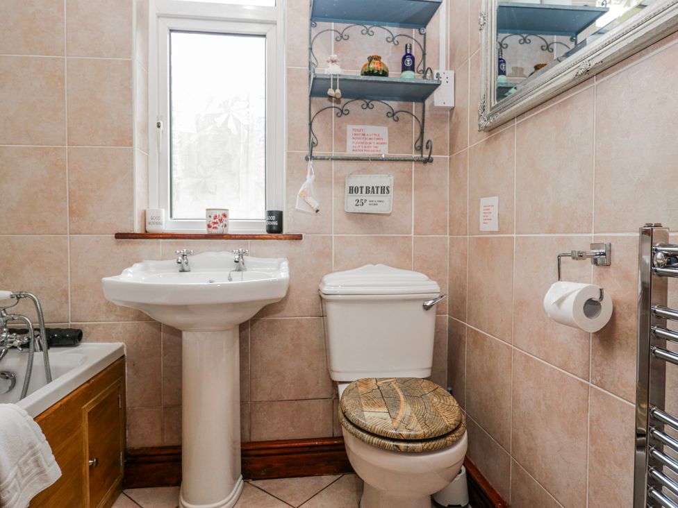 A bathroom with a sink and toilet at Linden Lea Field Broughton near Cartmel