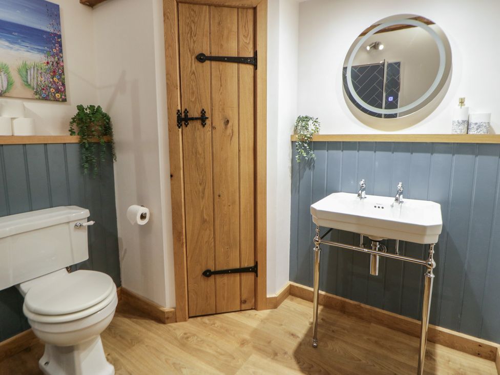 A bathroom with a sink and toilet at Wyn's Barn Nantmel near Rhayader