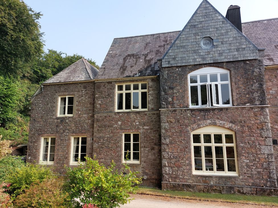 A house with stone walls and windows at Lukesland Wing near Ivybridge