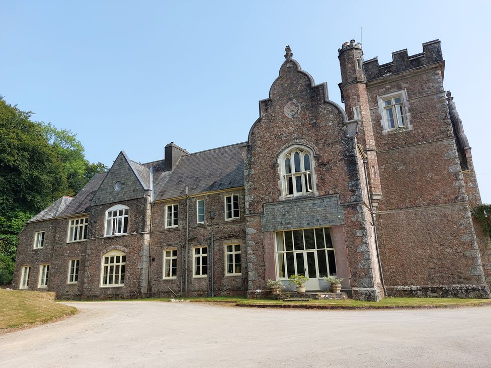 A historic building with multiple windows at Lukesland Wing near Ivybridge