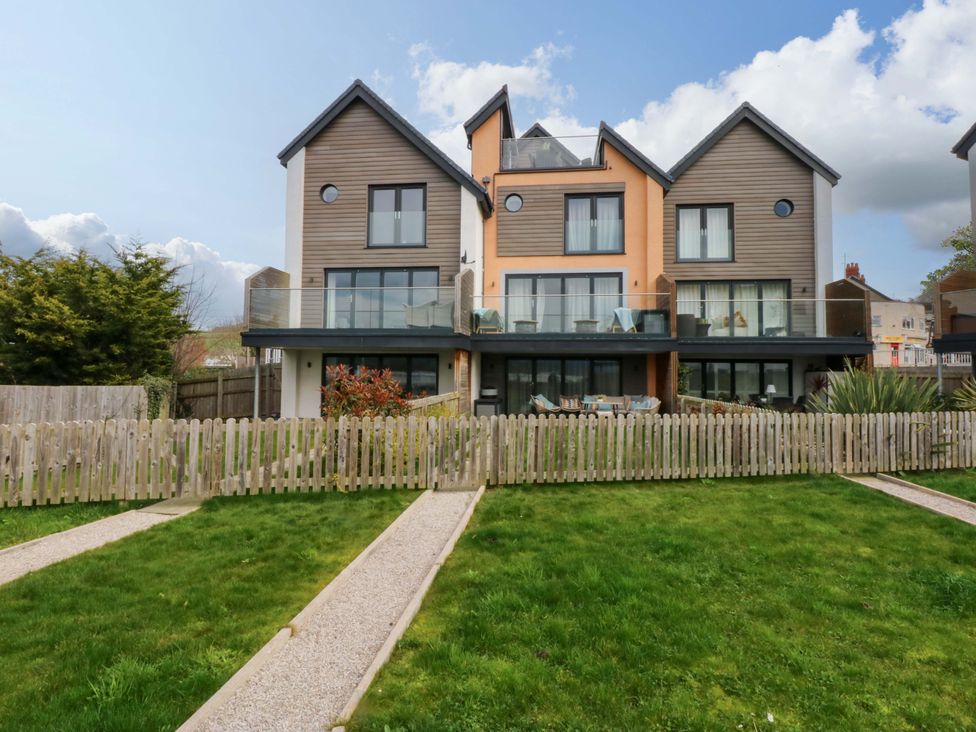 A house with balconies and a garden at 2 Glan Yr Aber in Colwyn Bay