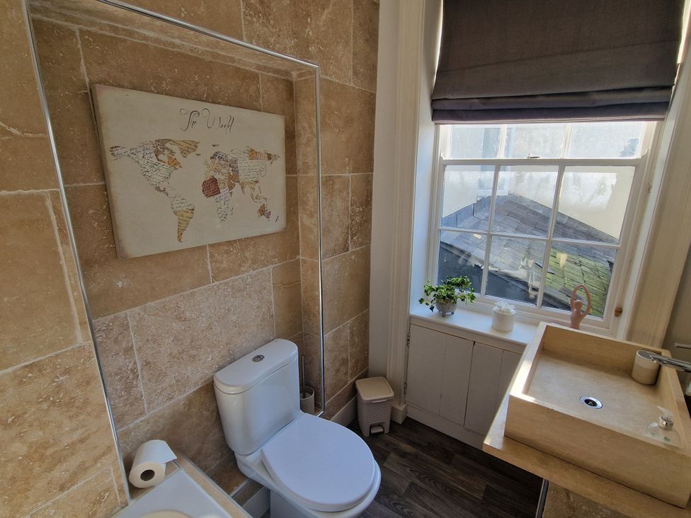 A bathroom with a sink and toilet at Flat 3 in Ross-on-Wye