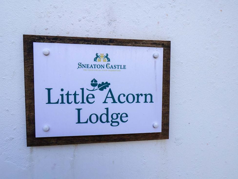 A sign for Little Acorn Lodge at Sneaton Castle in Whitby