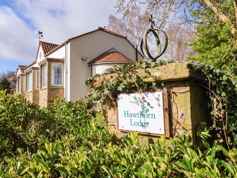 A building exterior with a sign at Hawthorn Lodge in Whitby