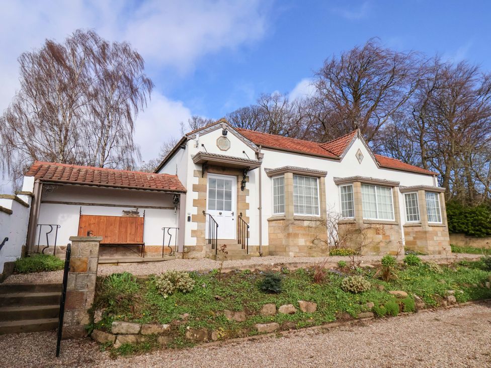 A house with a pathway and garden at Hawthorn Lodge in Whitby