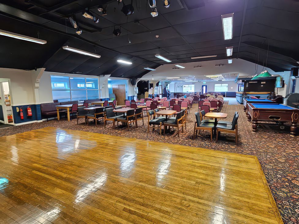 A recreation room with tables, chairs, and a pool table at Salt Air 130 @ Park Ave Holiday Village, Leysdown-On-Sea, Kent