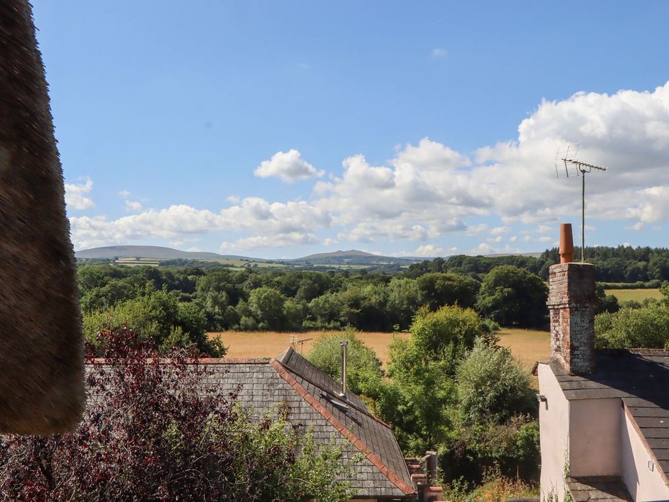 A view of fields and mountains from a property at The Cottage in Sampford Courtenay