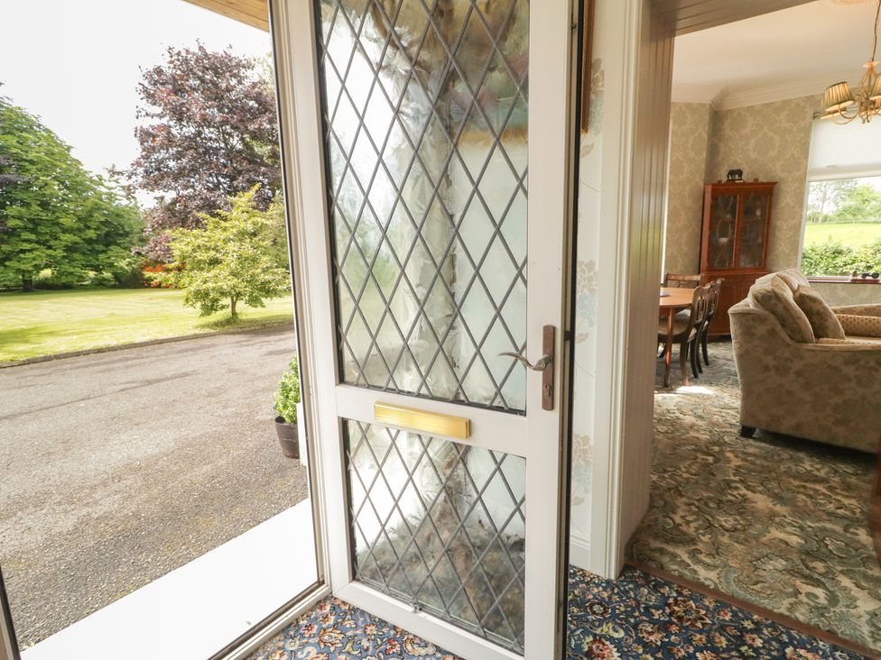 An entryway with a view of outdoor area and furniture at Riverdene in Mountjoy