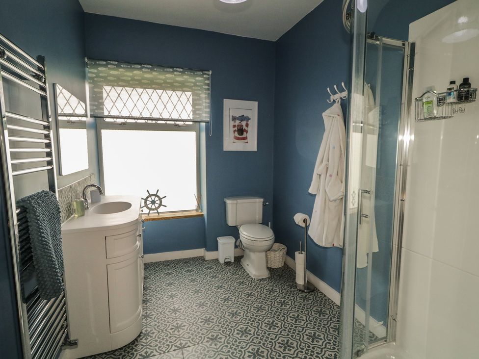 A bathroom with a sink and shower at Riverdene in Mountjoy