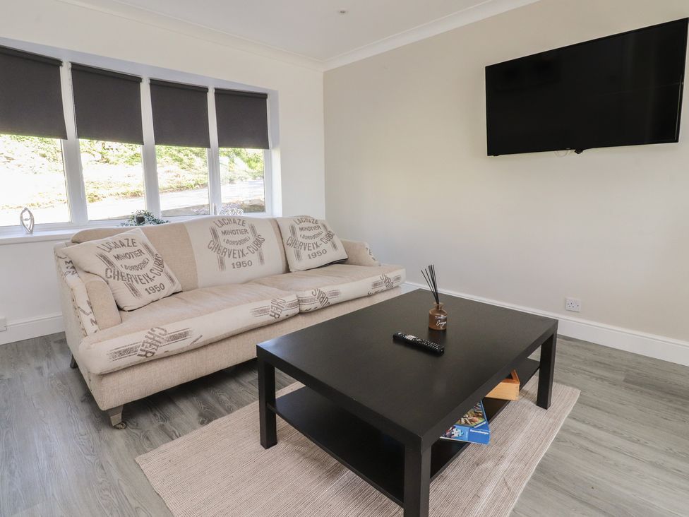 A living room with a sofa and coffee table at Beacon Fell Cottage 1 Preston