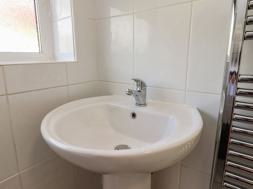 A sink and faucet in a bathroom at Beacon Fell Cottage 1 Preston
