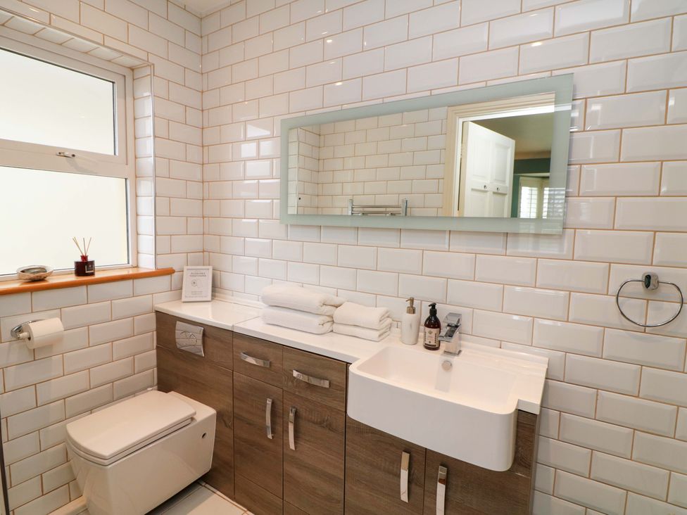 A bathroom with a sink and toilet at Sunnyside in River Chapel