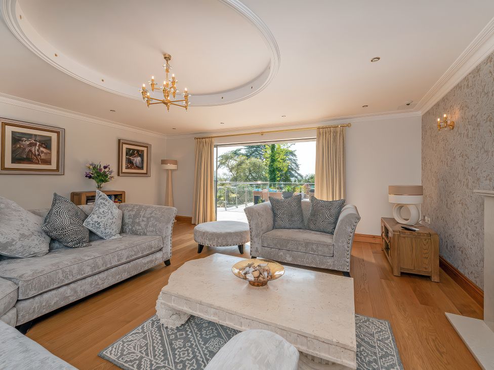 A living room with a sofa and coffee table at Hamble House in Southampton