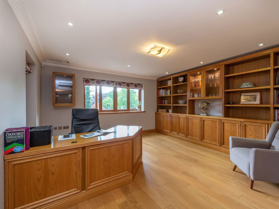 An office with a desk and shelves at Hamble House in Southampton