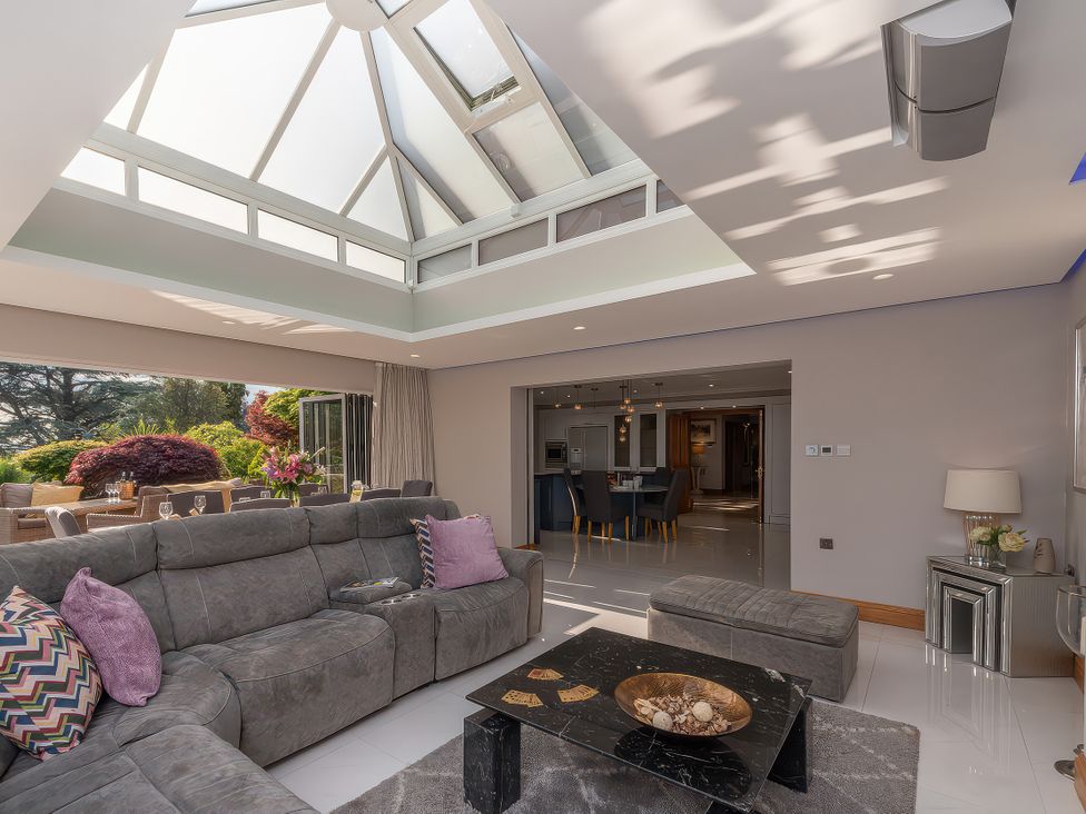 A living room with a sofa and coffee table at Hamble House in Southampton