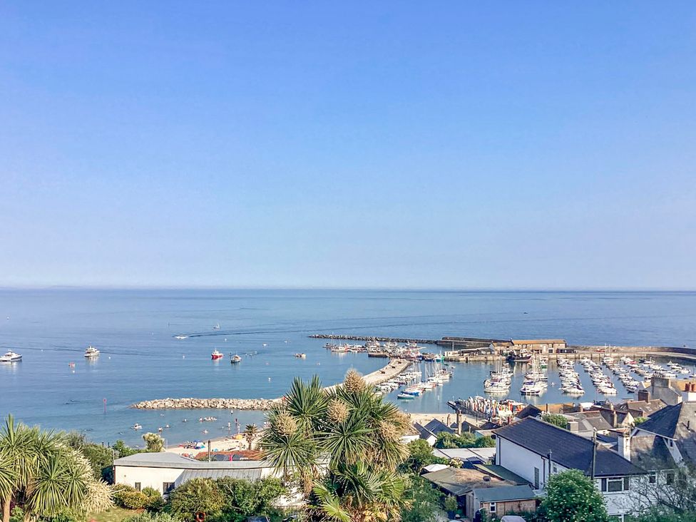 A marina with boats and houses in Uplyme