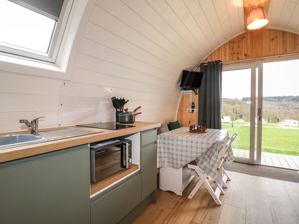 A kitchen with sink and stove at Bracelands - Deluxe Pod 6, Coleford