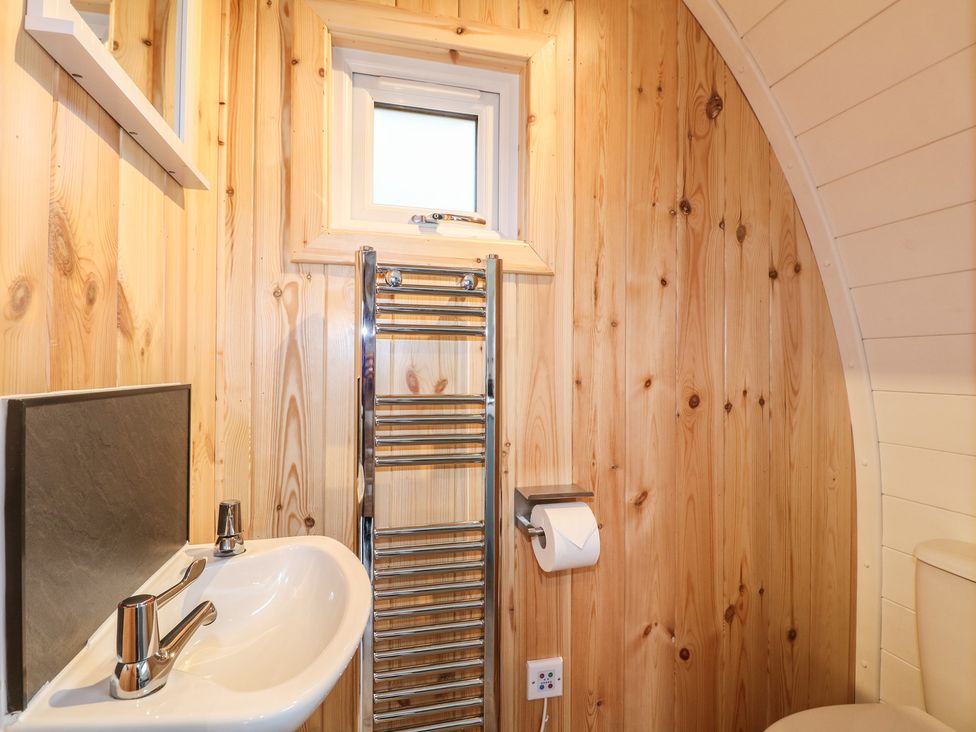 A bathroom with a sink and toilet at Bracelands - Deluxe Pod 6, Coleford