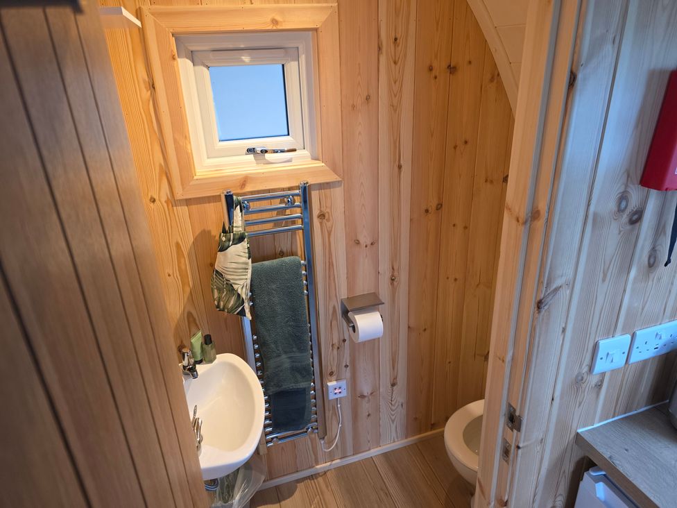 A bathroom with a sink and toilet at Bracelands - Deluxe Pod 6, Coleford
