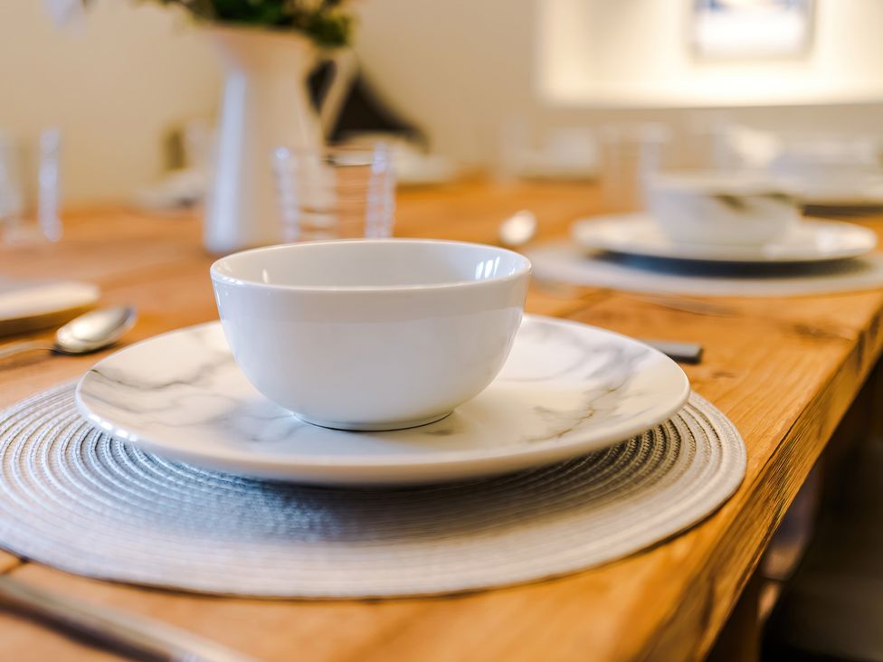A bowl on a plate set on a table at Landskill Farm in Preston