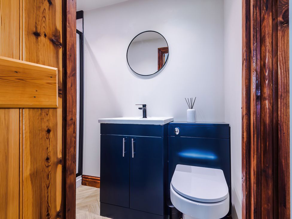 A bathroom with a sink and toilet at Landskill Farm in Preston