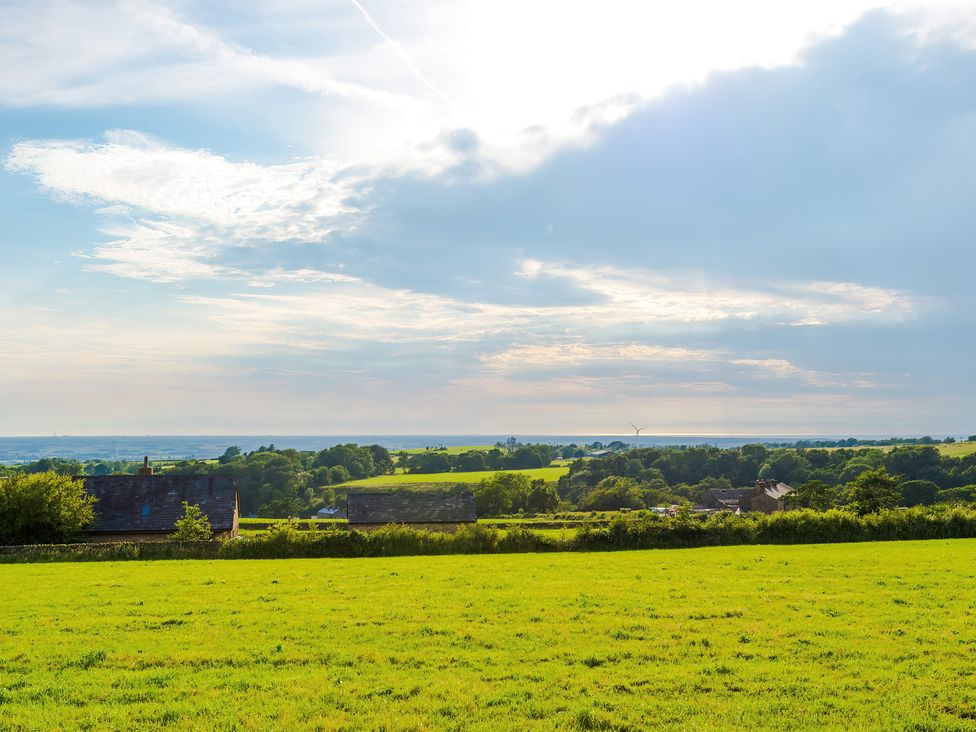 A view of fields and houses at Landskill Farm in Preston