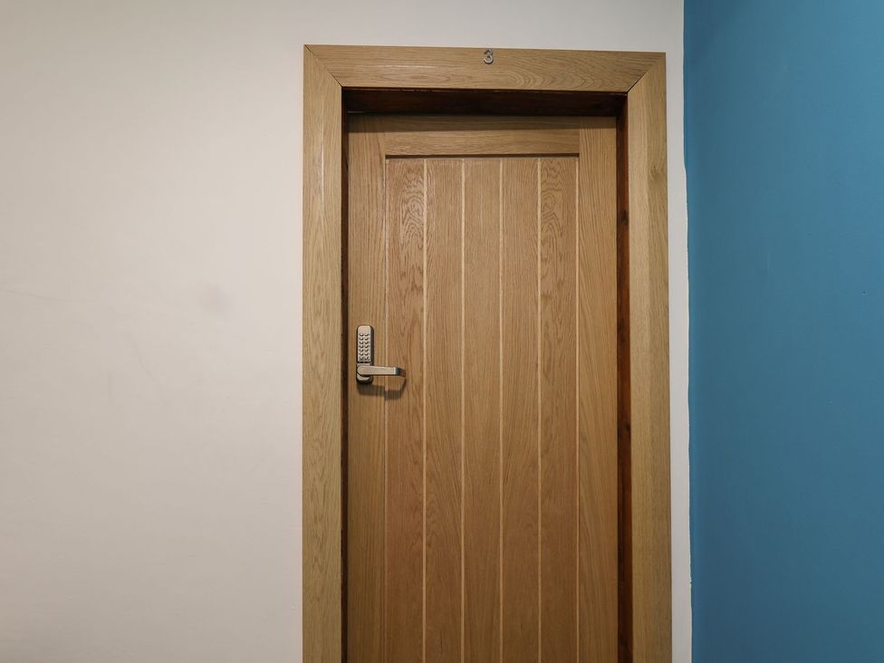 A door with a keypad lock labeled with number 3 at Frankie’s Seaview 3 in Bridlington