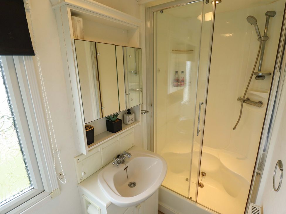 A bathroom with a sink and shower at Towervans Z11 in Mablethorpe