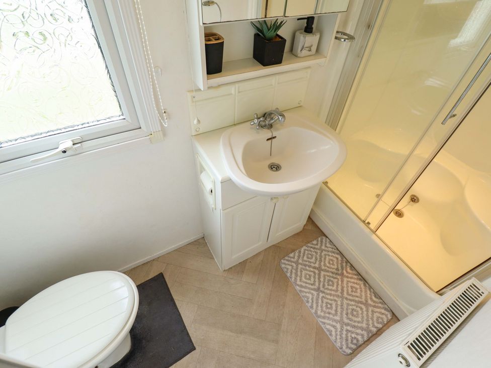 A bathroom with a sink and shower at Towervans Z11 in Mablethorpe