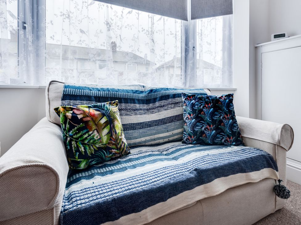 A sofa with cushions in a living room at Florence of Oxford Oxford