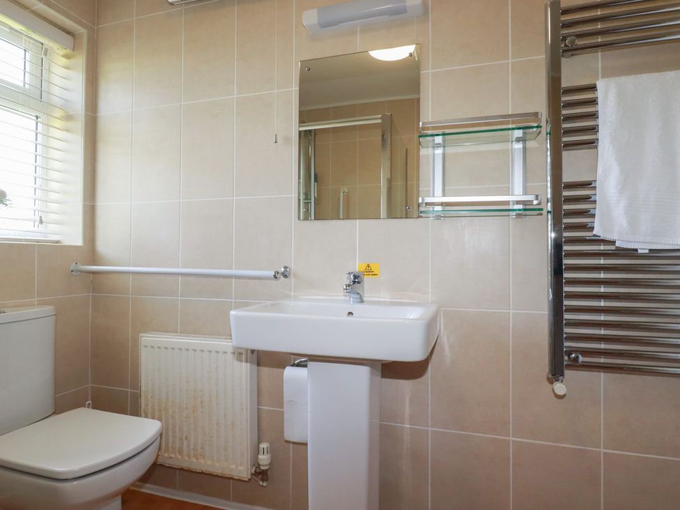 A bathroom with a sink and toilet at Tregoning annex in Lerryn near Lostwithiel