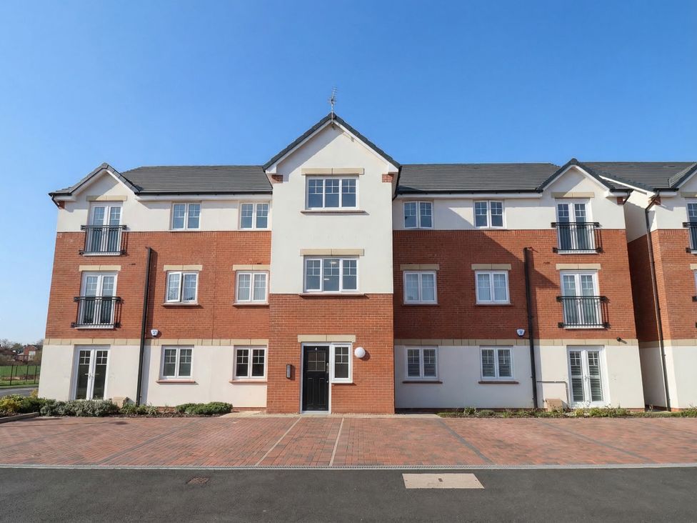 An apartment building with balconies and windows at Apartment 7 at Anfield Liverpool