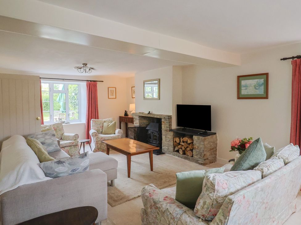 A living room with a sofa and armchairs at Harbins Farm Glanvilles Wootton Nr. Sherborne