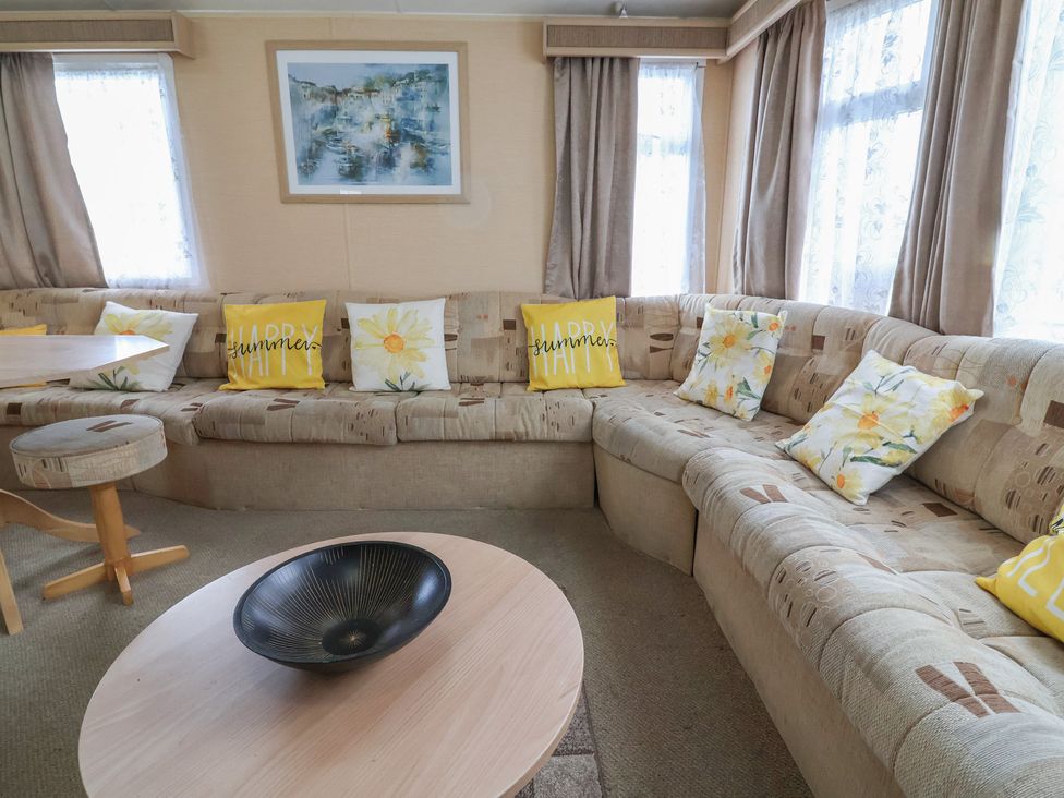 A living room with a corner sofa and coffee table at Winchester - 244