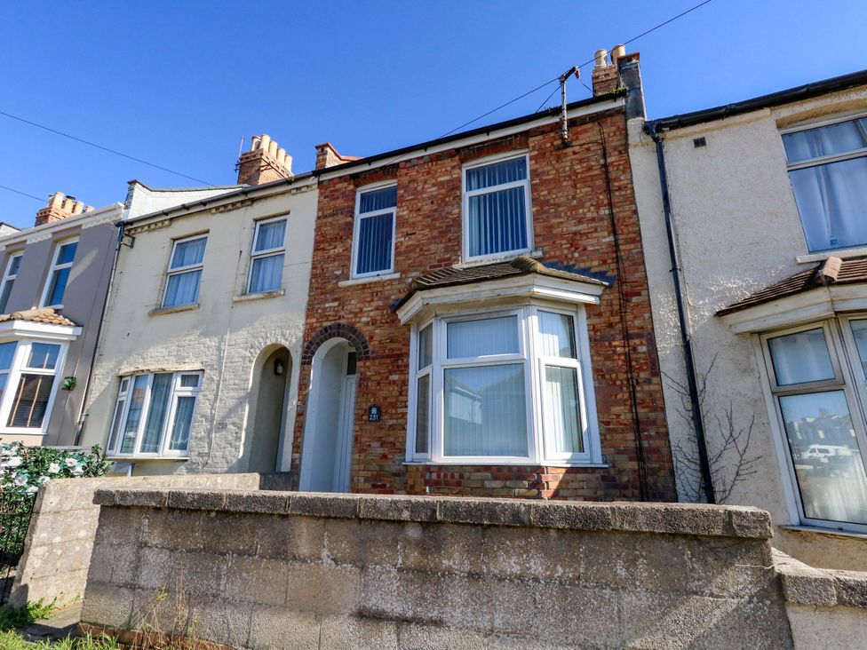 A brick house with a front entrance at Home from Home near the Sea Weymouth