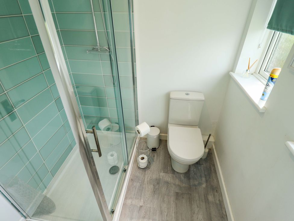 A bathroom with a shower and toilet at Field View in North Walsham