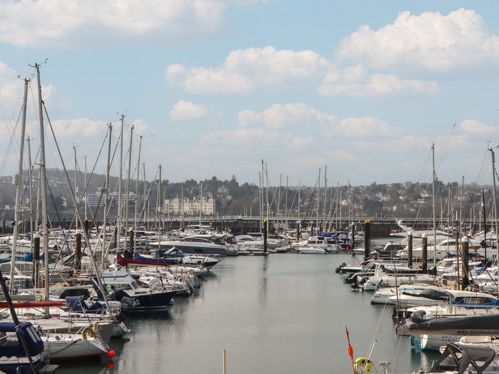A marina with sailboats and yachts at Marina Court Apartment in Torquay