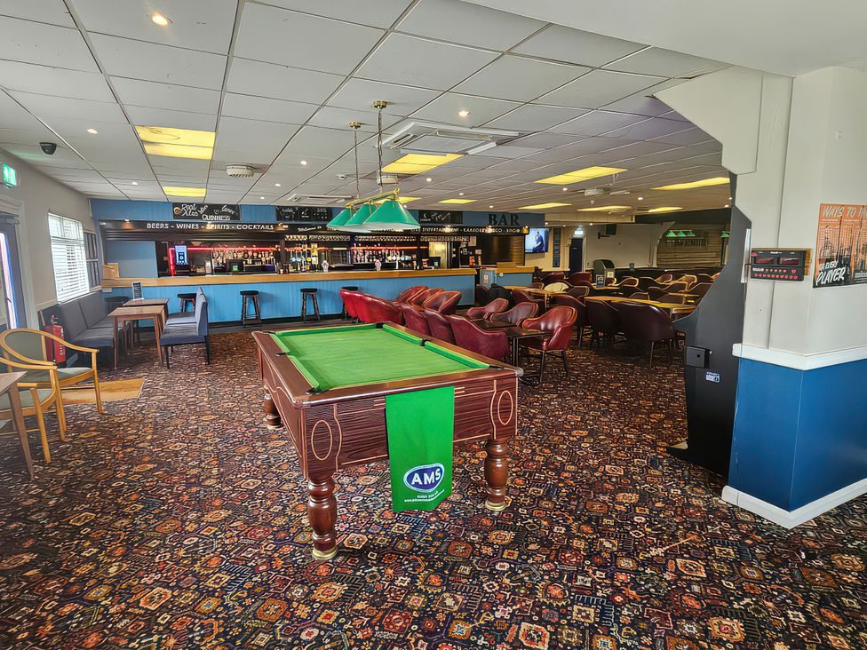 A bar area with pool table and seating at Watersmeet - 85 @ Park Avenue Holiday Village, Leysdown-On-Sea, Kent