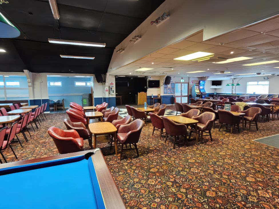A bar area with seating and a pool table at Watersmeet - 85 @ Park Avenue Holiday Village Leysdown-On-Sea, Kent