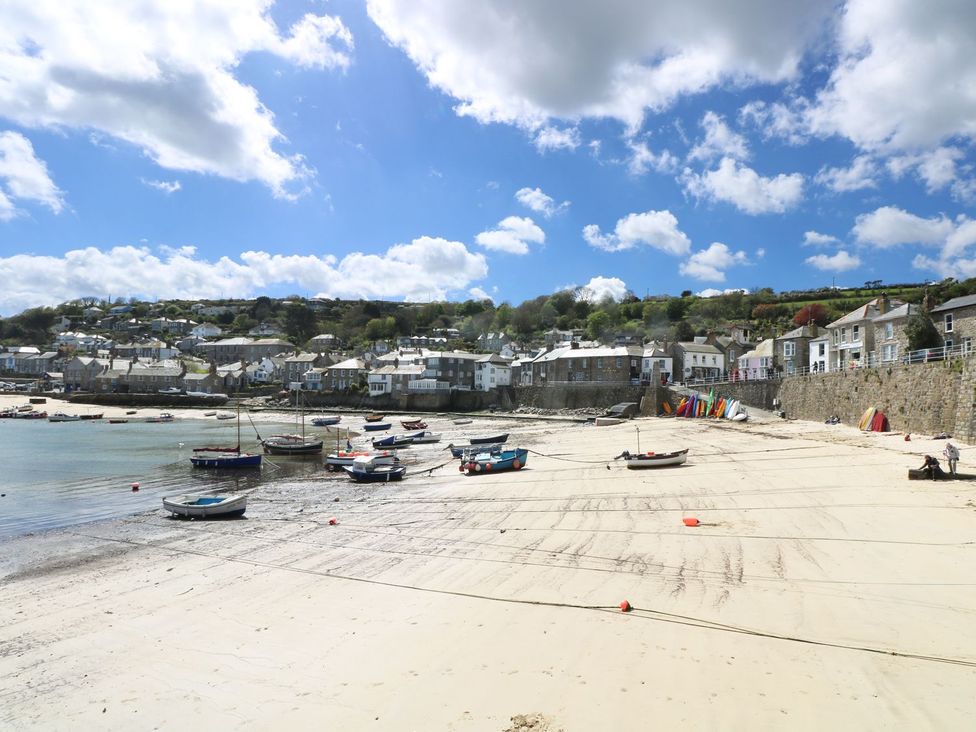 A view of boats on the beach at Wootton Gray in Penzance