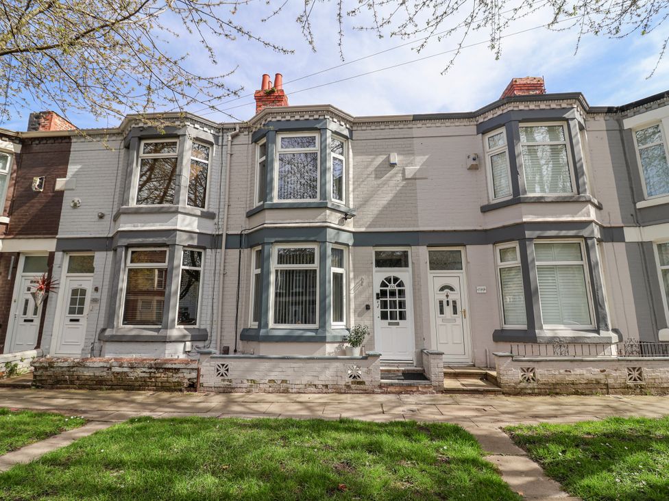 A house with multiple windows and doors at Ince Lodge Liverpool