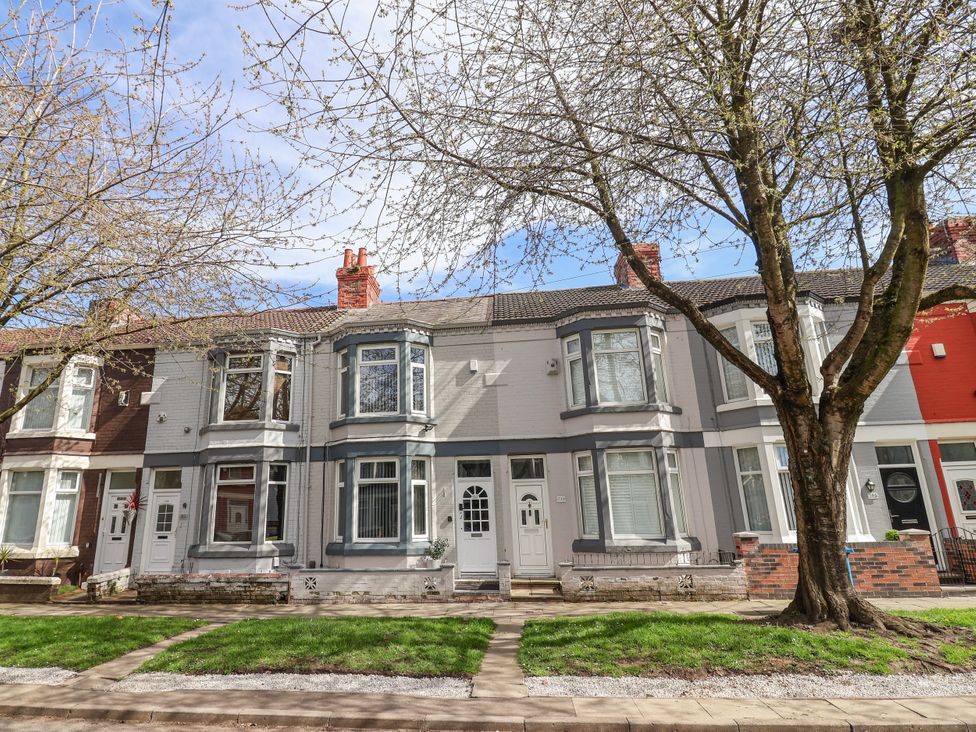 A residential building with trees and a walkway at Ince Lodge Liverpool