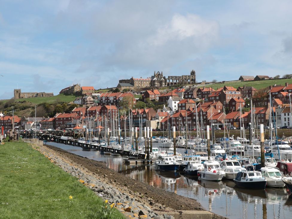 A marina with boats and buildings at Rails End