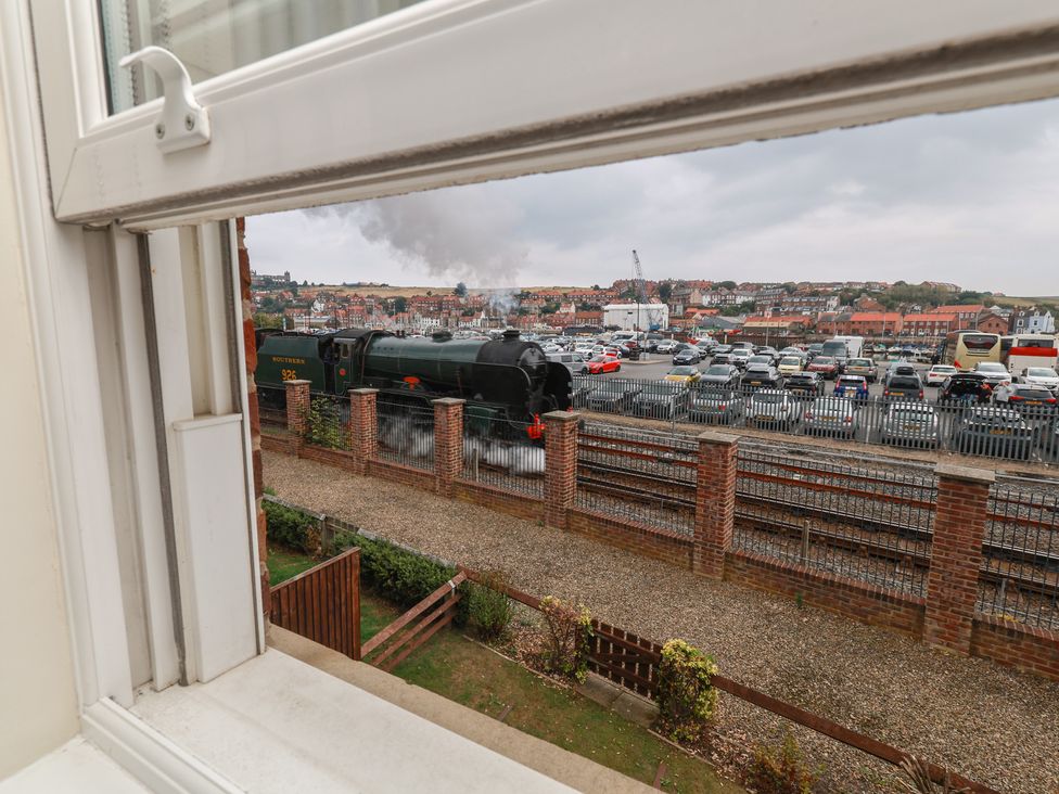 A train viewed from a window at Rails End in Whitby