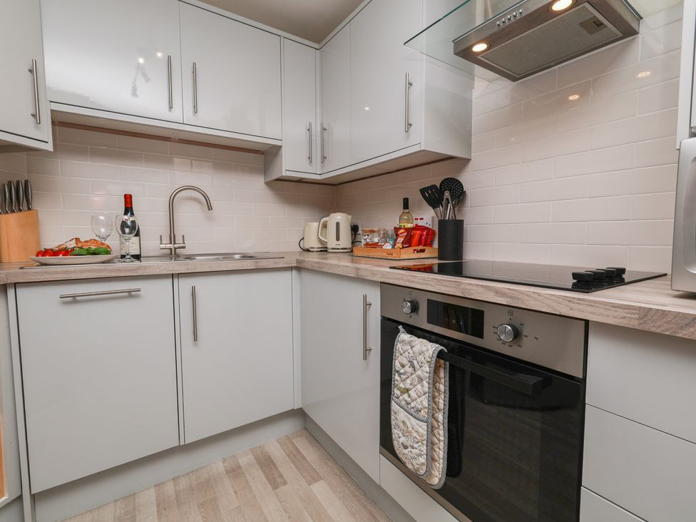 A kitchen with sink and appliances at Rails End in Whitby