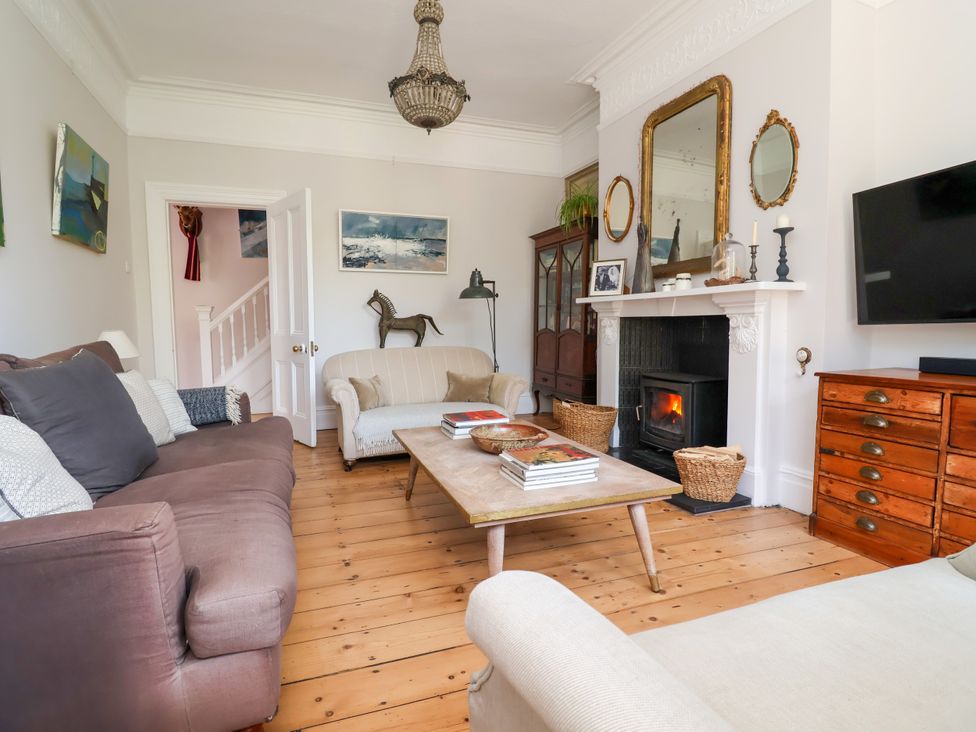 A living room with furniture and a fireplace at 34 Eaton Road in Chester